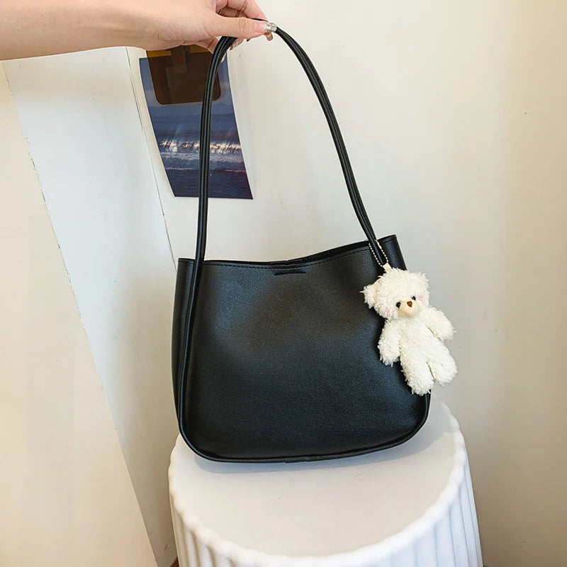 Simple And Casual New Popular PU Leather Versatile Shoulder Underarm Bag Small Fresh Solid Color Bear Pendant Handbag Your Shop Mania